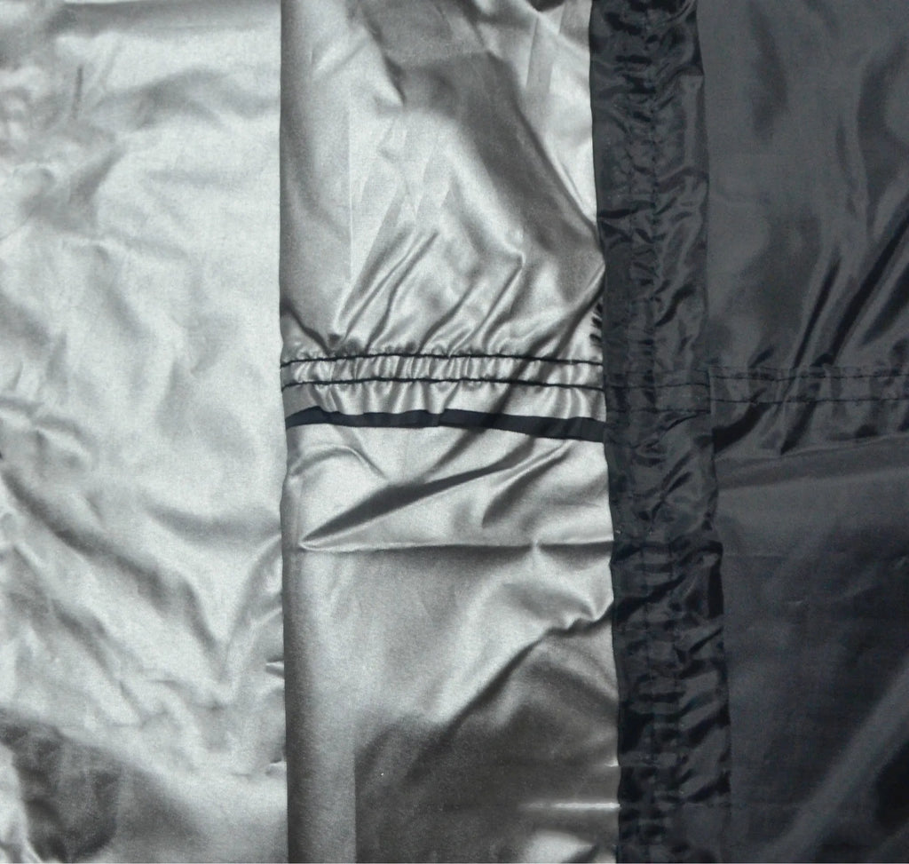 Black outdoor grill cover with silver inner coating, 58x77cm, for barbecue protection