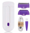White electric hair removal shaver with foil head and trimmer head attachment on a blue background.