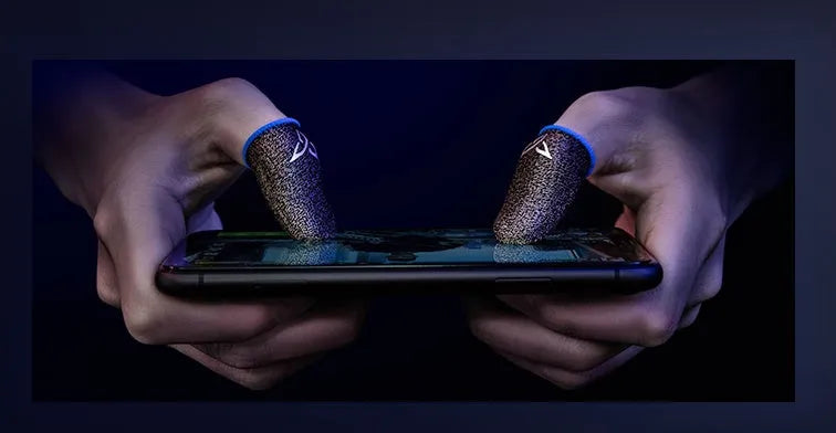 A pair of green gaming thumb sleeves made from silver fibre yarn with a reflective 3M logo.