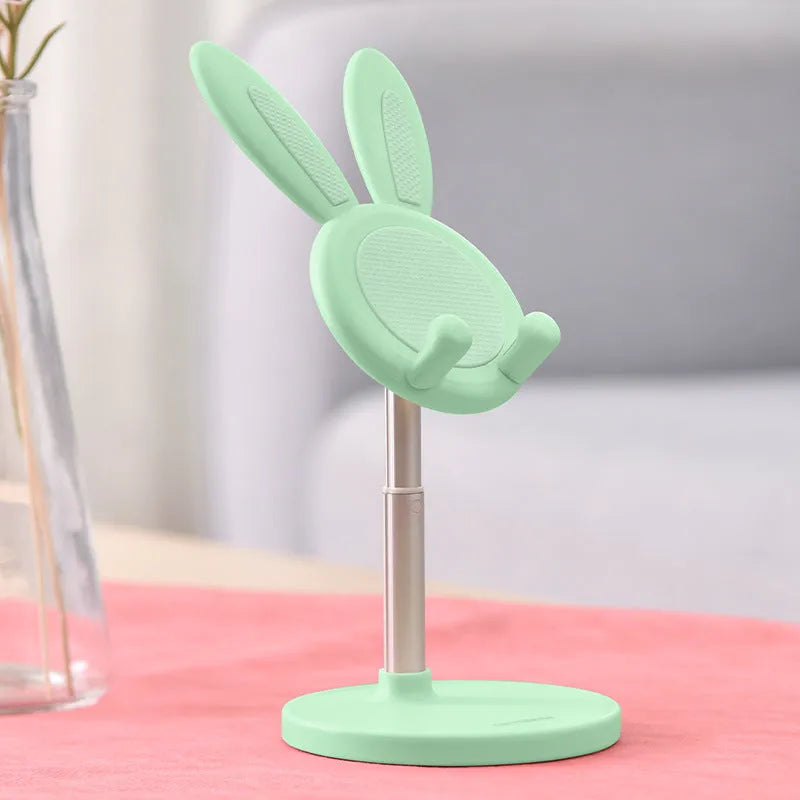 Rabbit-shaped silicone phone stand in pink, green, or white with adjustable scalable desktop holder