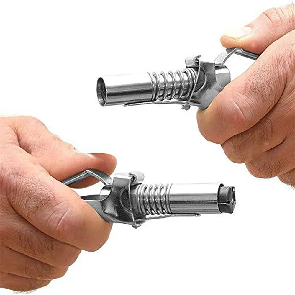 Silver lock-clamp high-pressure grease nipple new style on a clean workbench