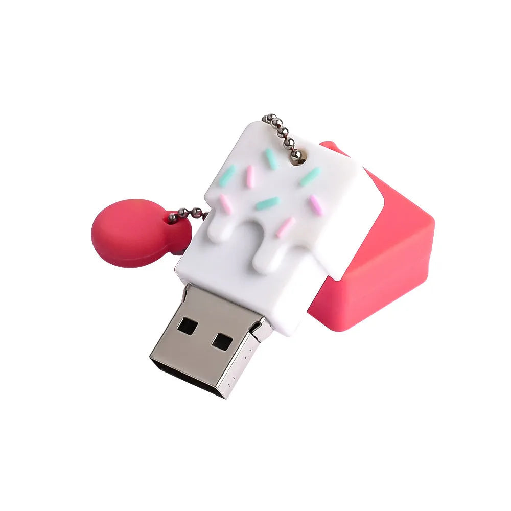 Cartoon cake pendant USB flash drive with PVC case, anti-loss attachment and 32GB capacity.