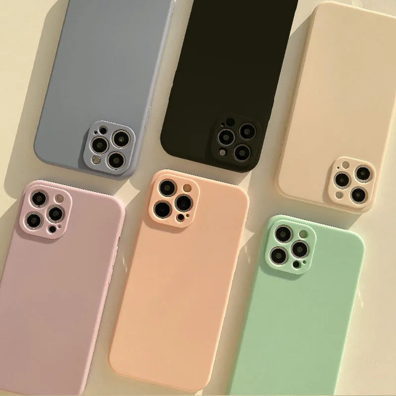 Frosted matte TPU phone back cover case for iPhone 14 in slate blue colour on a table.