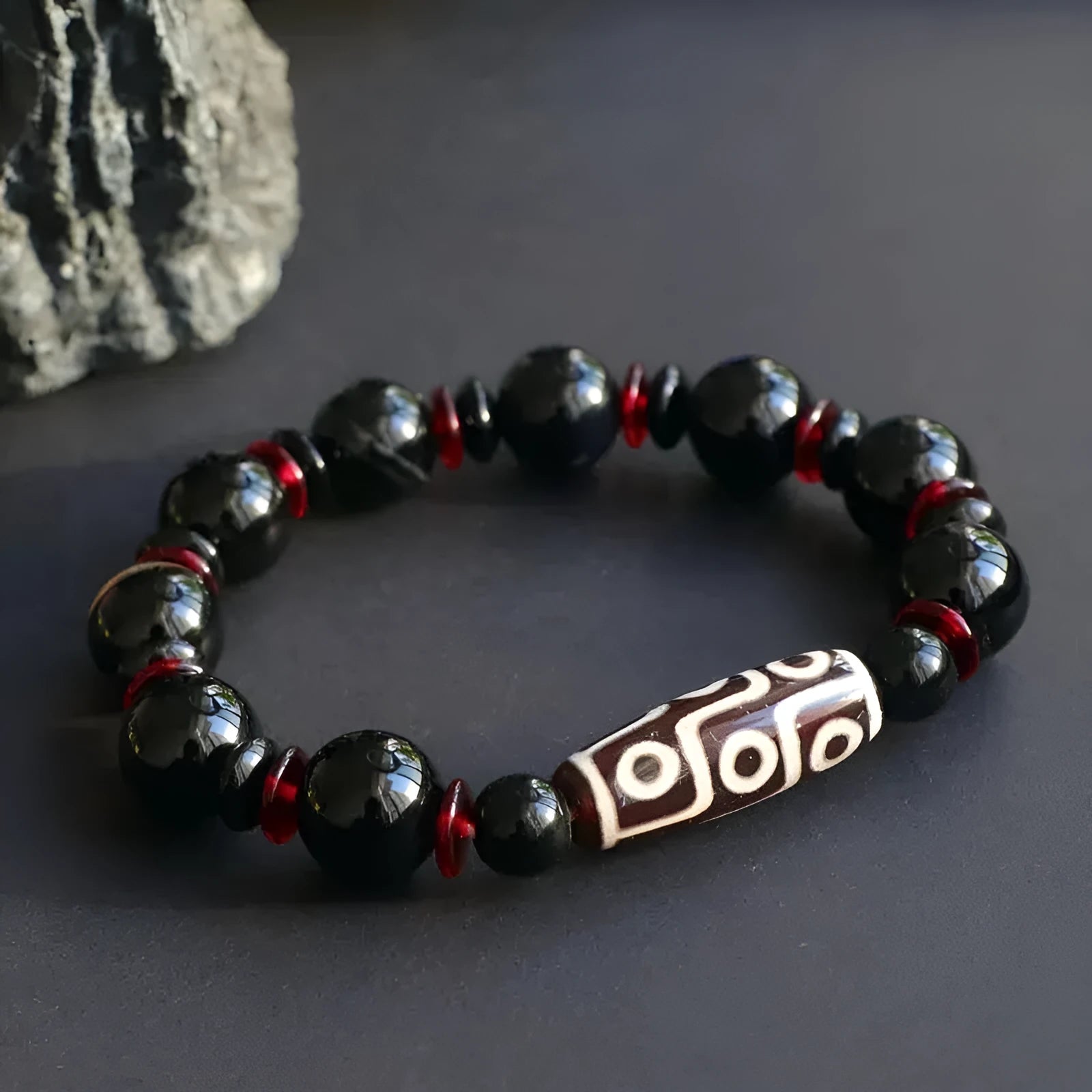 Hand-woven black agate and chalcedony dzi bead bracelet with 11mm geometry beads