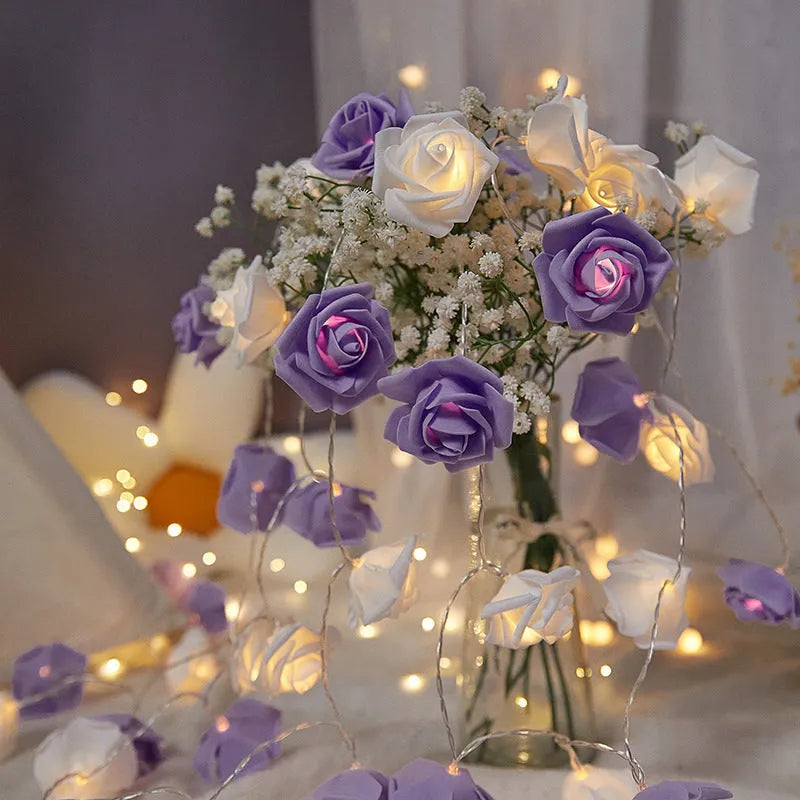 LED rose fairy light string with battery pack for indoor holiday decoration.