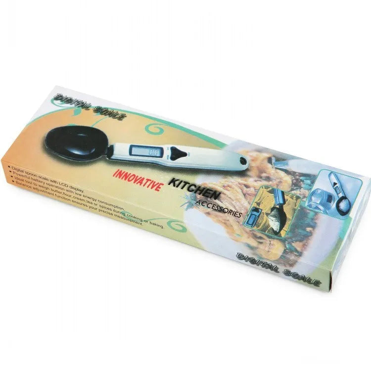 Digital kitchen measuring spoon with LCD screen showing weight measurement