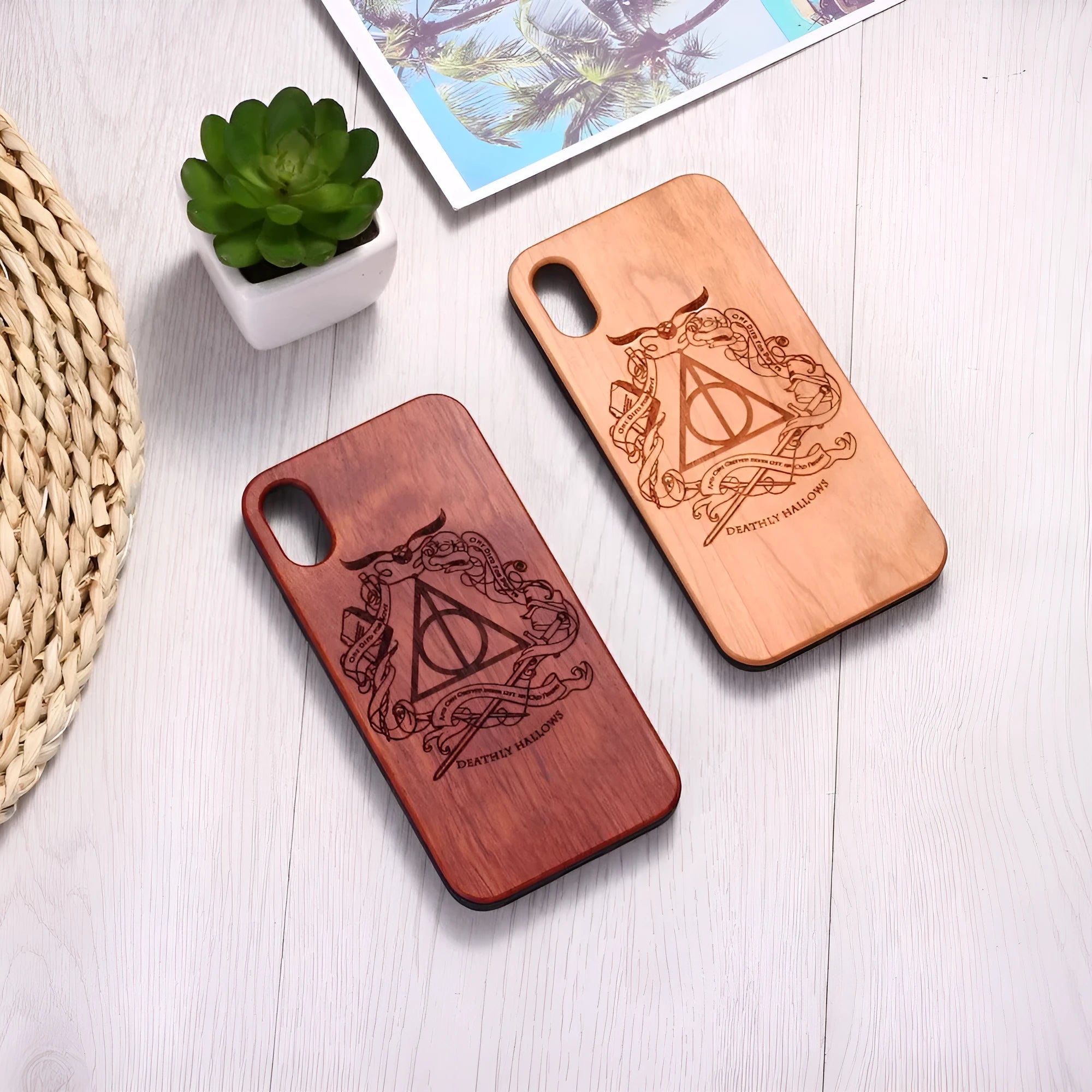 Wooden phone case with laser carving details for iPhone and Samsung smartphones in cherry or rosewood.