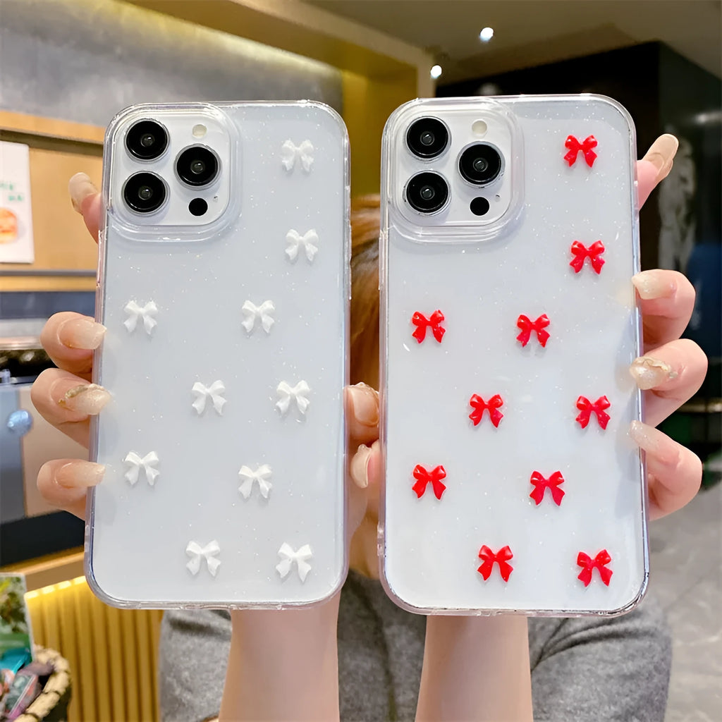 Epoxy glitter bow silicone iPhone case in white, black, purple, or red for iPhone 11 to 16 Pro Max.