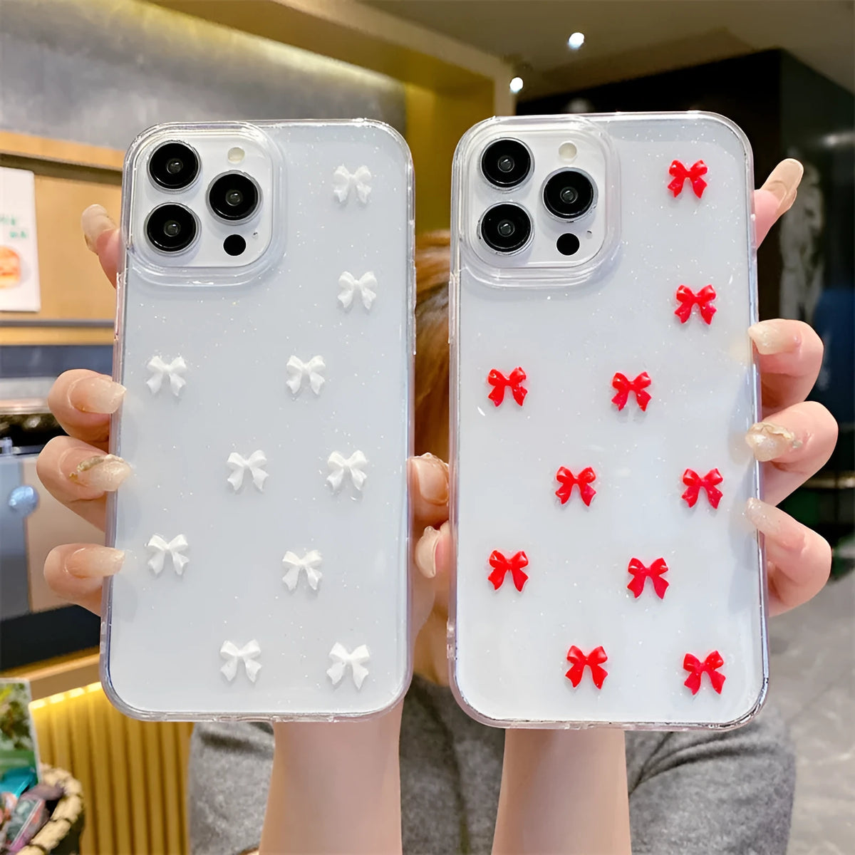 Epoxy glitter bow silicone iPhone case in white, black, purple, or red for iPhone 11 to 16 Pro Max.
