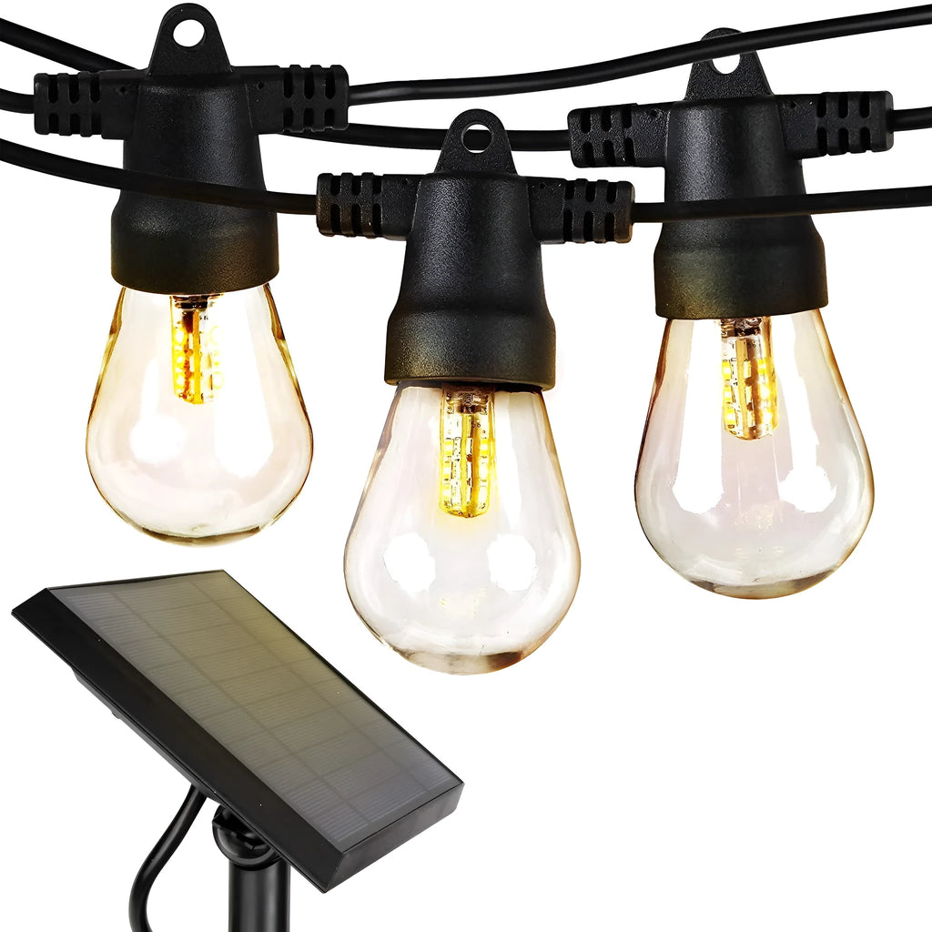 Waterproof solar-powered LED string lights with PVC bulbs in an outdoor garden setting.
