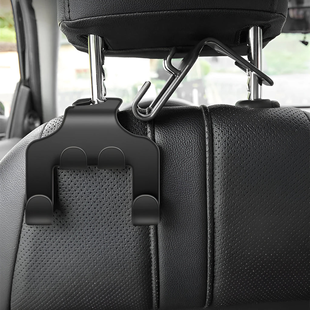 Two white ABS car-mounted multifunction hooks showing phone bracket and hanging hook uses.