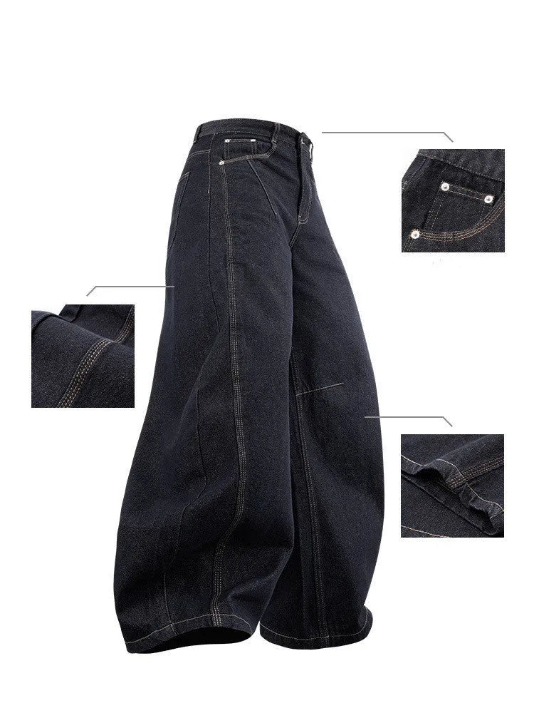 Men's wide leg denim trousers in original cow colour, showing mid-waist and relaxed fit.