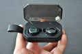 Samload Wireless Headphones 5.0 Bluetooth earbuds in black with ear hooks and charging case