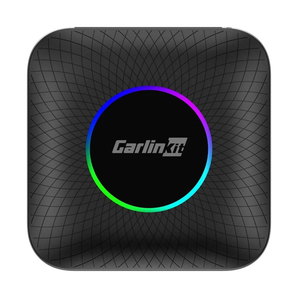 Black car wireless conversion box with data cables for wired CarPlay and Android Auto systems.
