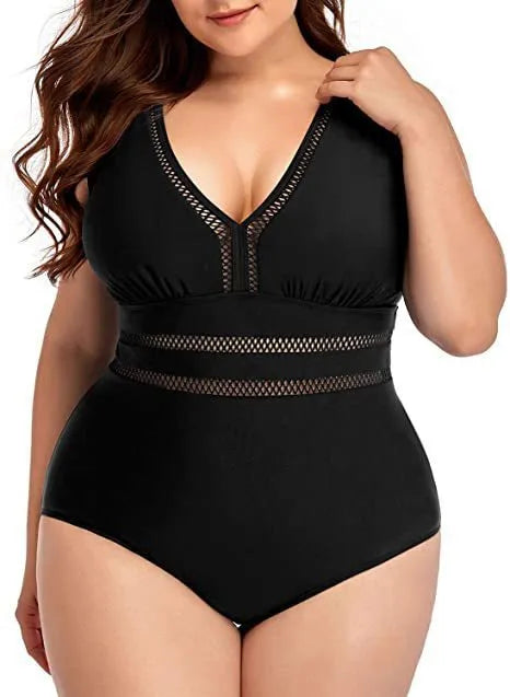 Black printed plus size women's bikini swimsuit with mesh stitching, shown on a model.