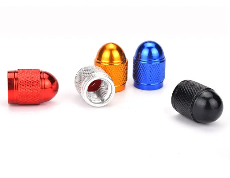 Aluminium mountain bike tyre valve caps in black, blue, gold, red and silver colours