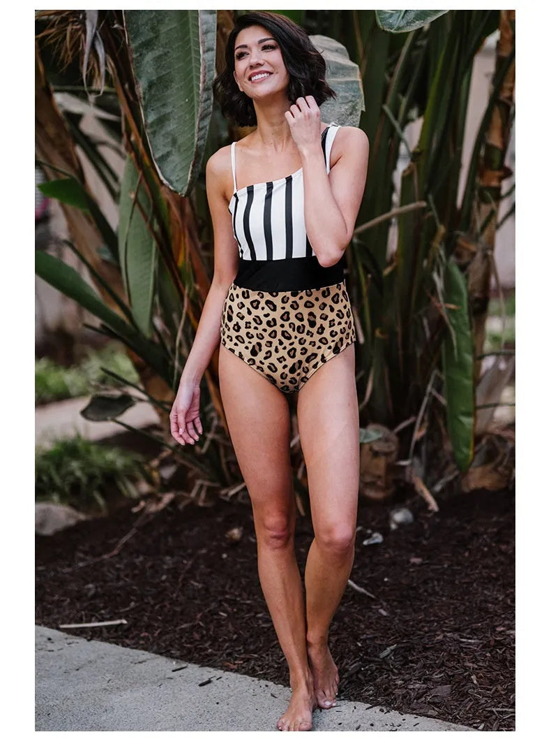 Women's leopard print high waist one-piece swimsuit with asymmetric collar, shown sleeveless.