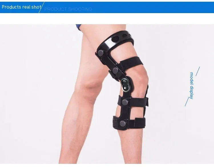 Black anterior ligament knee pad and supporter showing brushed cloth exterior with sponge cushioning