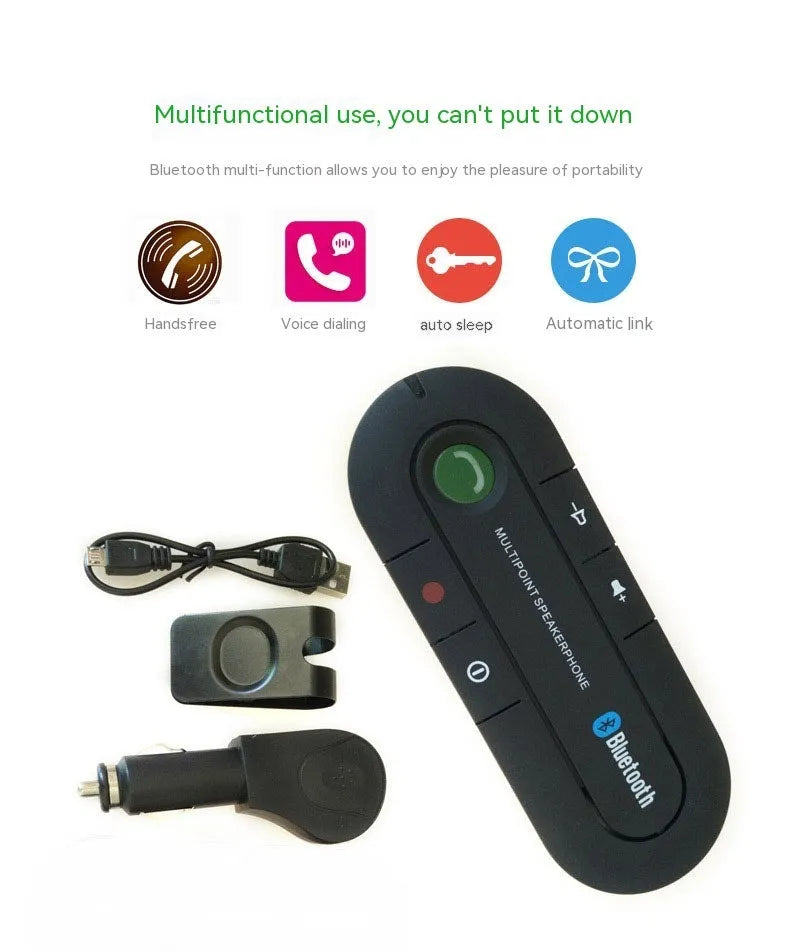 Black vehicle-mounted Bluetooth handsfree unit clipped to a car sun visor, with car charger and cable.