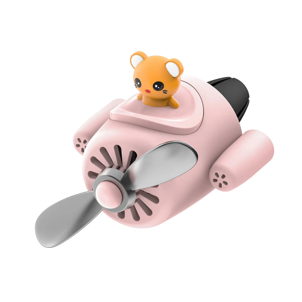 Cartoon aeroplane-shaped plastic clip for car air vent, includes fragrance slices, in black, blue, orange, or pink.