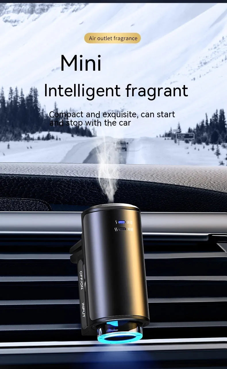 Obsidian black smart car aroma diffuser clipped onto a car air vent