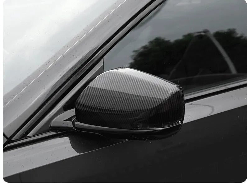 Set of ABS plastic mirror covers for Cadillac CT5 CT6 in carbon fibre, silver, and rain frame styles.