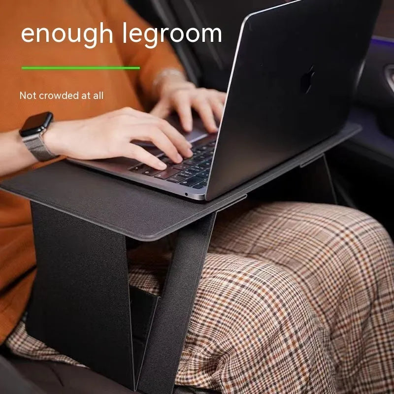 Foldable wooden laptop tablet stand in black, standard size, with legs open on a flat surface