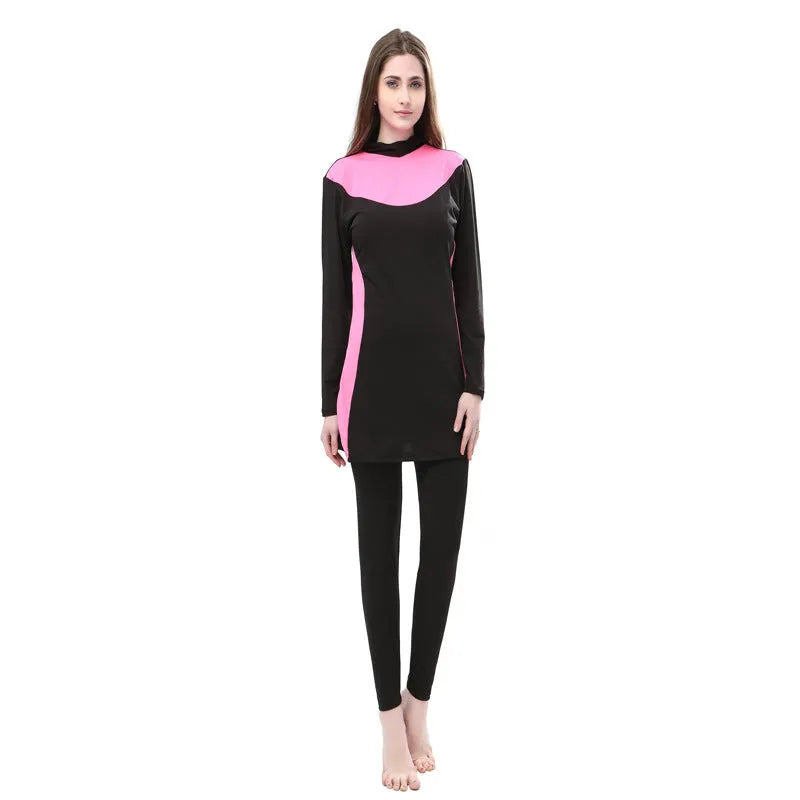 Conservative long sleeve hooded swimsuit top and pants set for women on a mannequin.
