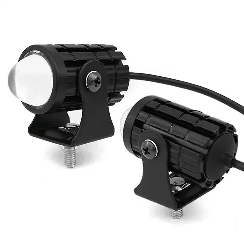 Motorcycle spotlight with dual-colour lens, aluminium housing, showing white and yellow light modes.