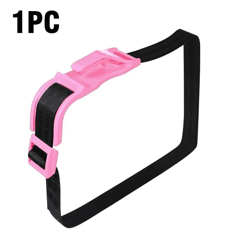 Pregnancy car seat belt adjuster shown in use, redirecting seat belt over thighs instead of abdomen.