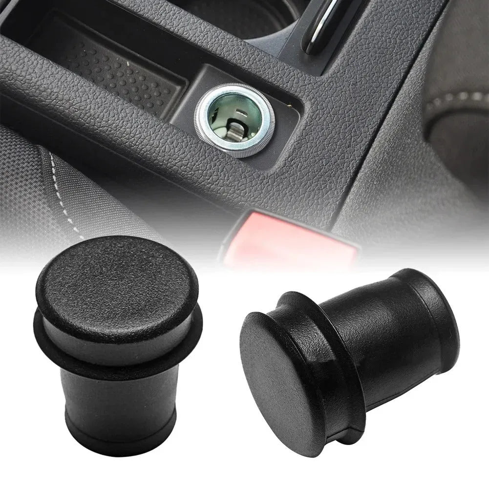 Black PVC car cigarette lighter dust plug for 12V socket protection.