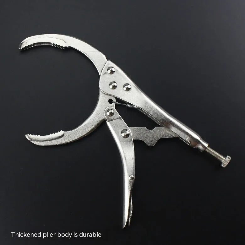 Adjustable clamp oil filter wrench with 50-110mm range on a workshop bench
