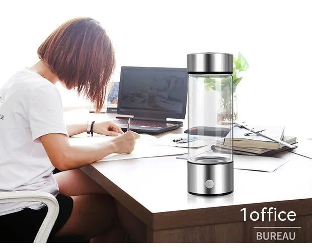 Silver electric hydrogen water bottle generator with borosilicate glass and rechargeable base
