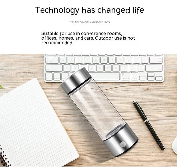 Silver electric hydrogen water bottle generator with borosilicate glass and rechargeable base