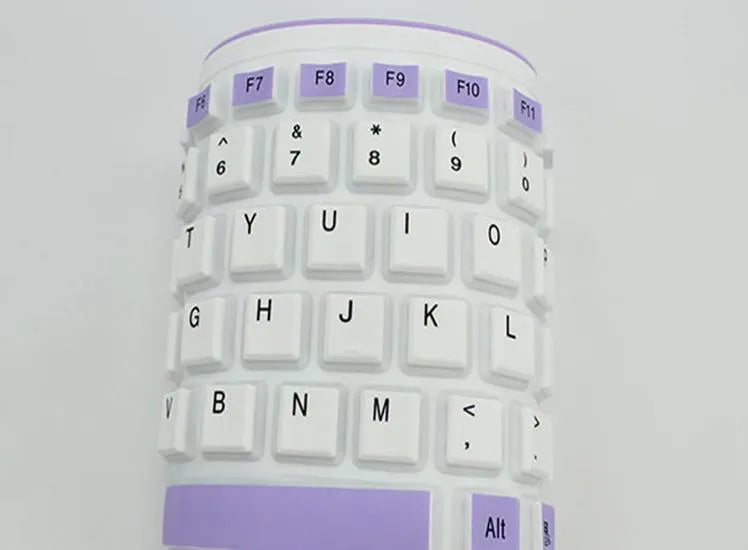 Folding waterproof dustproof silicone keyboard with USB cable, shown in pink, purple, green, blue, black, or orange.