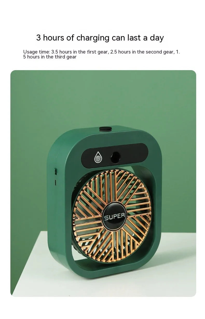 Green and white USB portable misting fan humidifier on a desk showing adjustable vent and water tank.