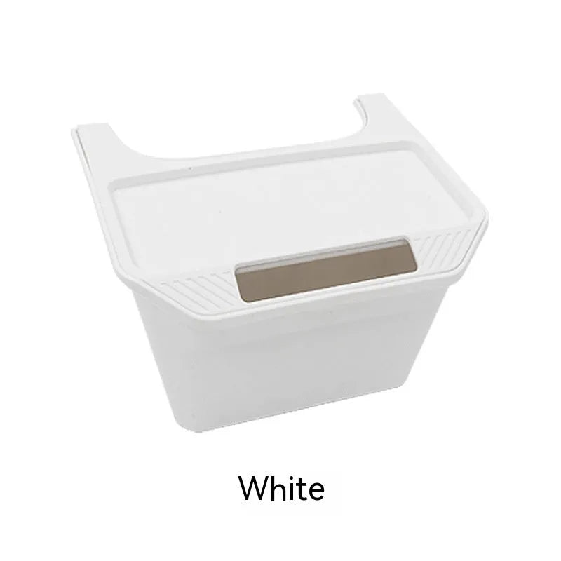 Black rectangular plastic rear middle storage box with handle on car seat