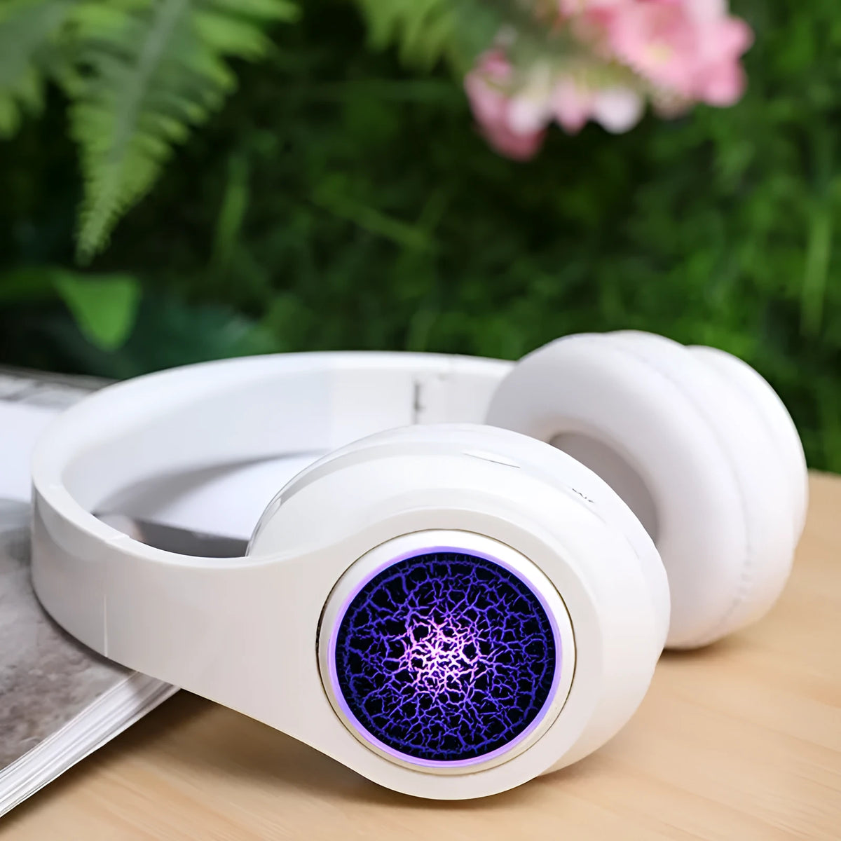 Head-mounted luminous Bluetooth 5.0 headset with stereo sound, power display, and 10 metre range in black, white or red