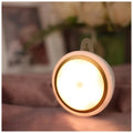 Round white motion sensor LED light for wardrobe or corridor with 80mm diameter.
