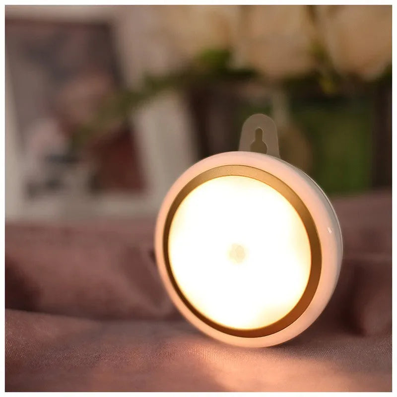 Round white motion sensor LED light for wardrobe or corridor with 80mm diameter.