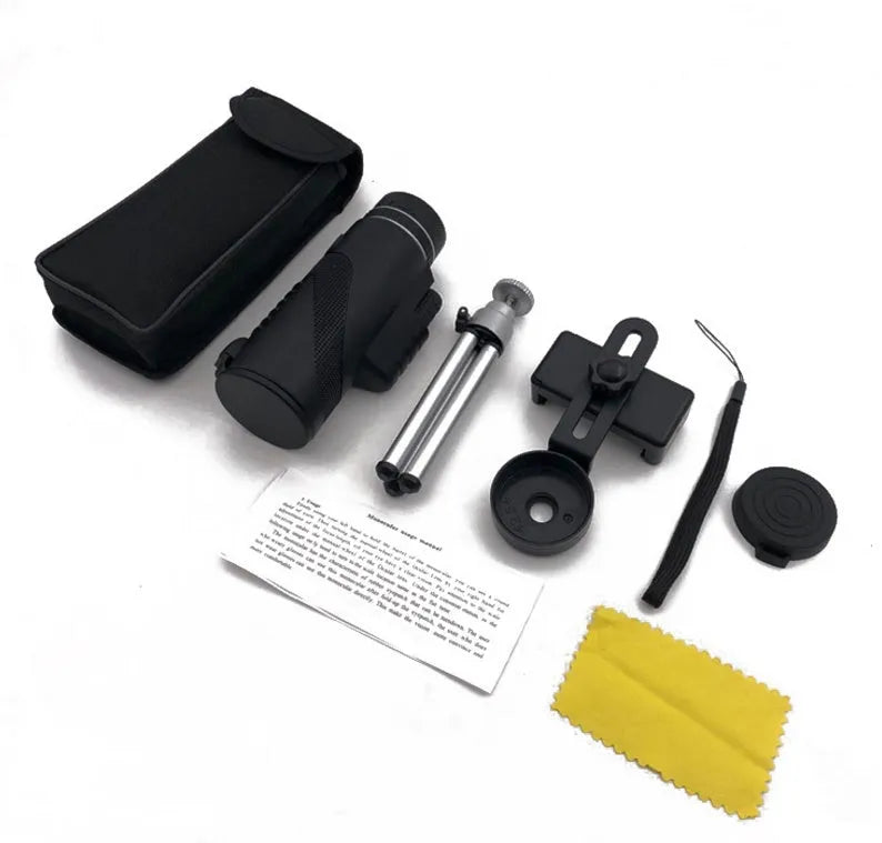 Black HD 40x60 monocular telescope with smartphone mount shown on a table.