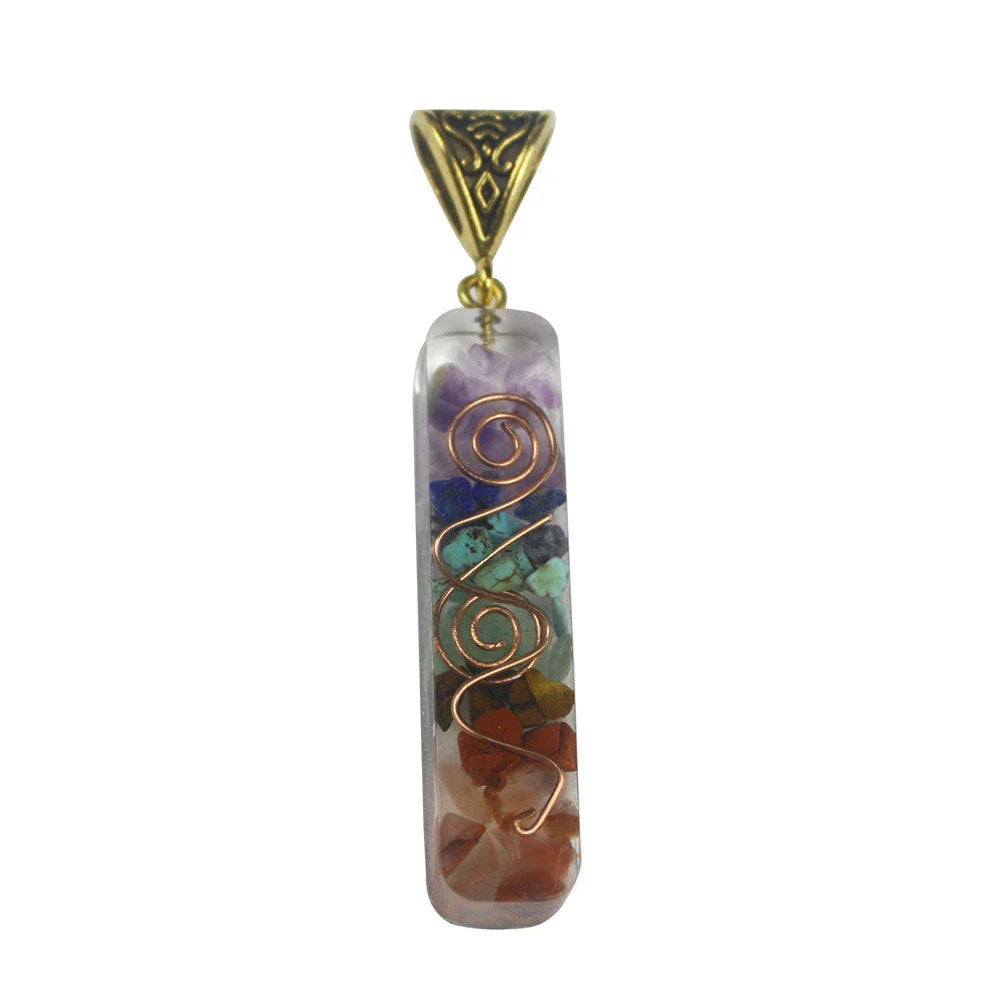 Chakra-inspired acrylic pendant with a unique geometric design and natural variations in the stone patterns