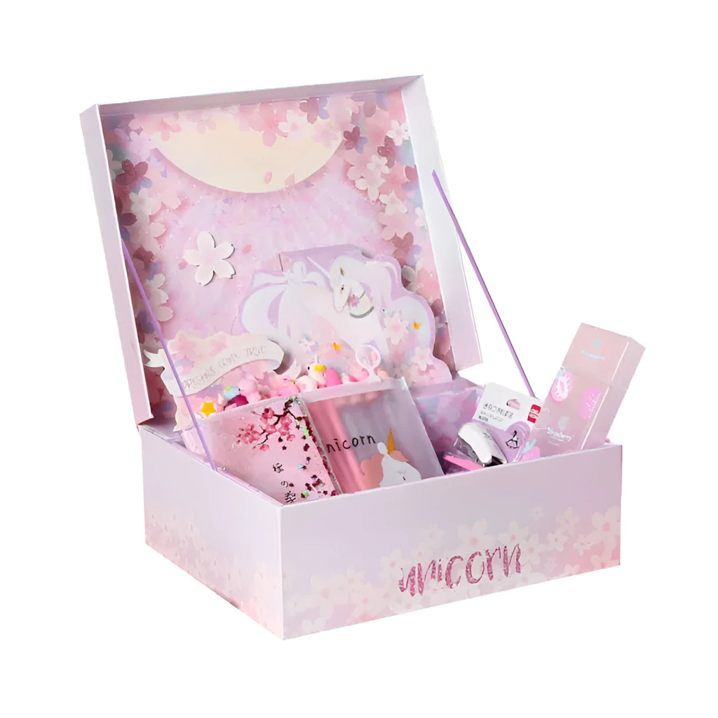 Stationery gift bag with B5 and A5 notebooks, pens, correction tape, clips, ruler, and decorative accessories
