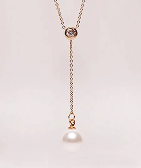 Stainless steel plated 18K rose gold single drill necklace with zircon inlay, geometric pendant