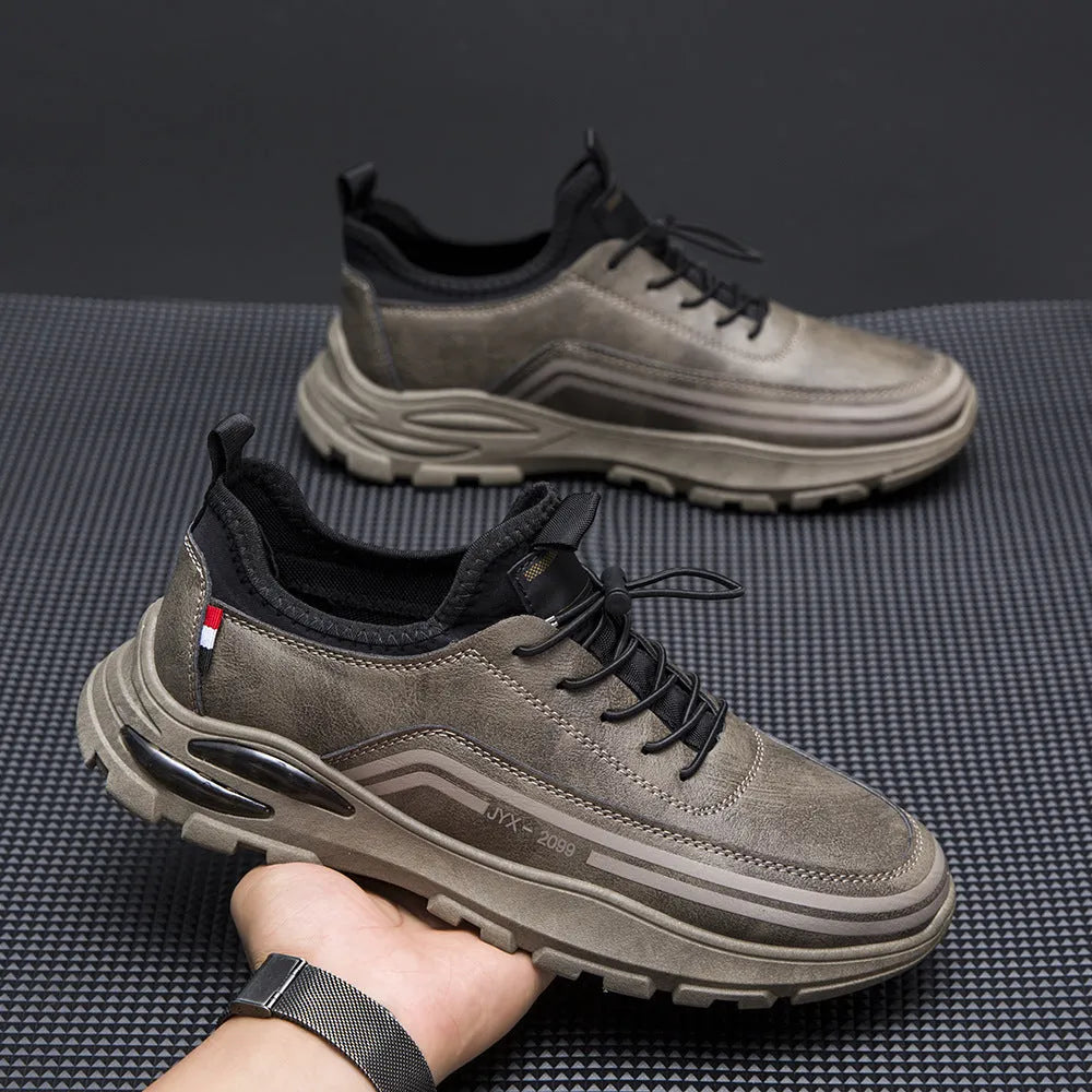 Men's black fleece-lined waterproof sneakers with a round toe and rubber sole on a white background.