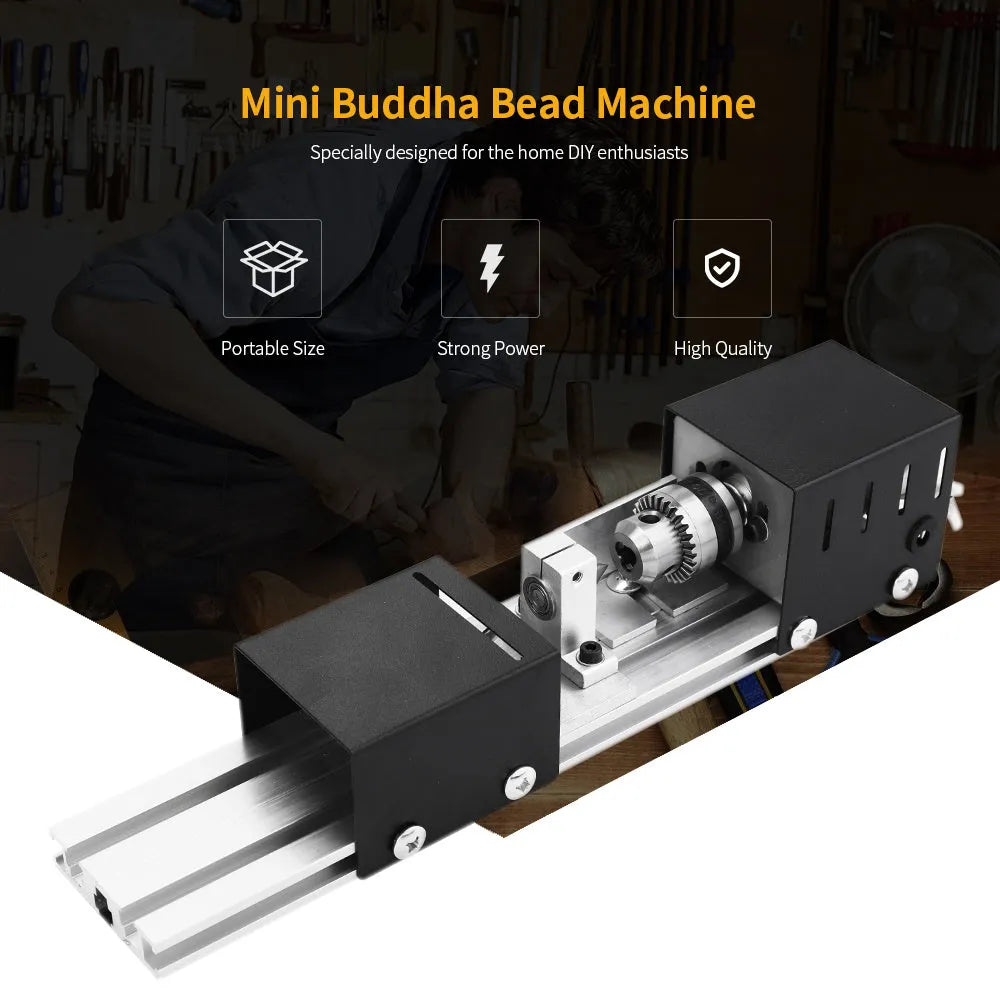 Silver metal mini manual woodworking lathe with tools on a workbench