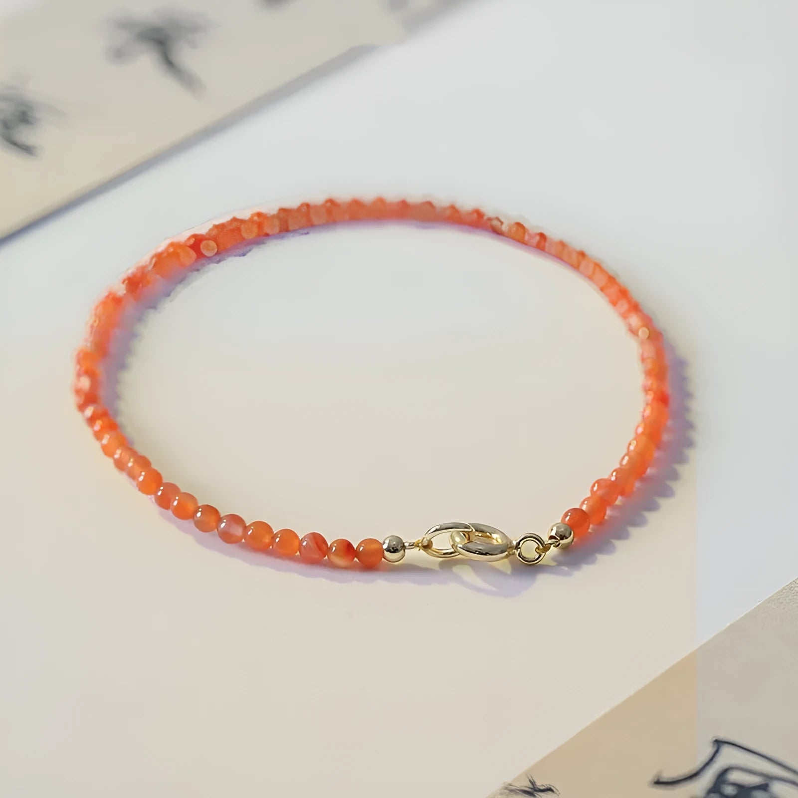 Women's retro bracelet with natural southern red agate beads in cherry red, showing 3mm cut surface style.