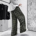 Japanese retro plaid loose pants in straight-leg cut, available in black or green