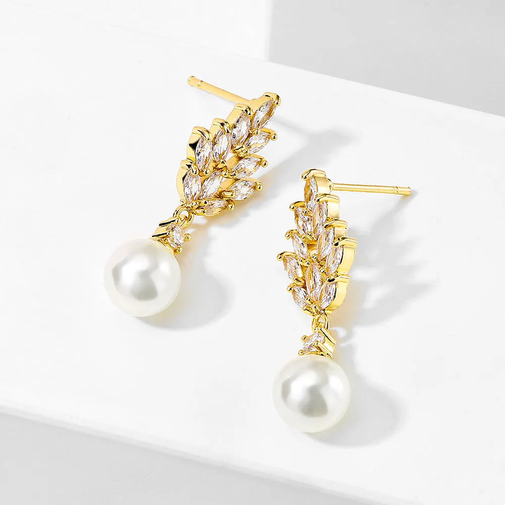 Geometric flower earrings with micro inlaid zircon and pearl details in gold, platinum, or rose gold finishes