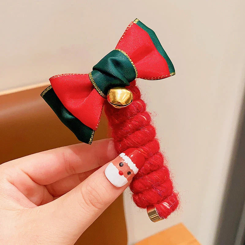 Festive Christmas Hair Ties with designs like jingle bells, Christmas trees, and reindeer - fun holiday accessories for girls